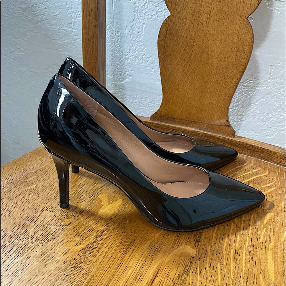 Calvin Klein patent leather pumps. Brand New, Worn once.
